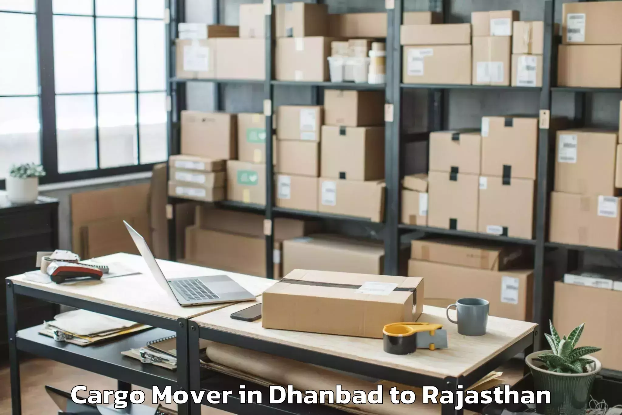 Top Dhanbad to Jk Lakshmipat University Jaipu Cargo Mover Available